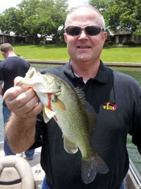 Gary catching fish on Lake Austin