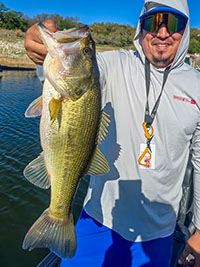 Santos with a nice 4lb Lake Travis bass