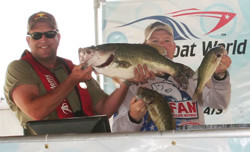 Tom is holding up my beautiful Lake Belton Hawg, at 10.13 pounds