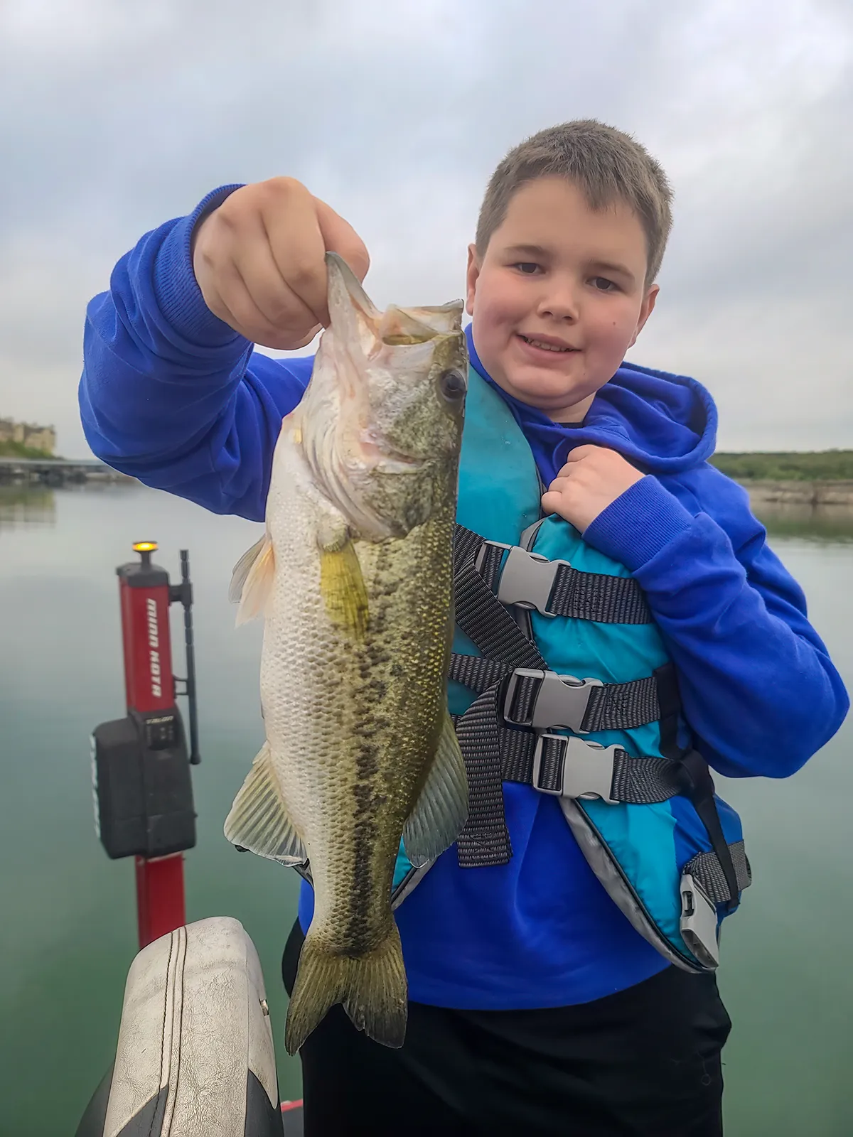 Firstfish — bass fishing catch with Texas Hawgs