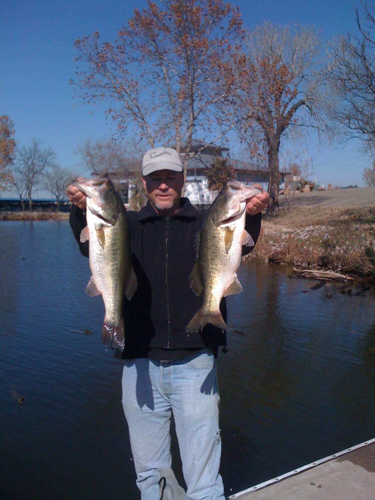 Angler with two winter largemouth bass at a Lake LBJ jackpot tournament, January 2010