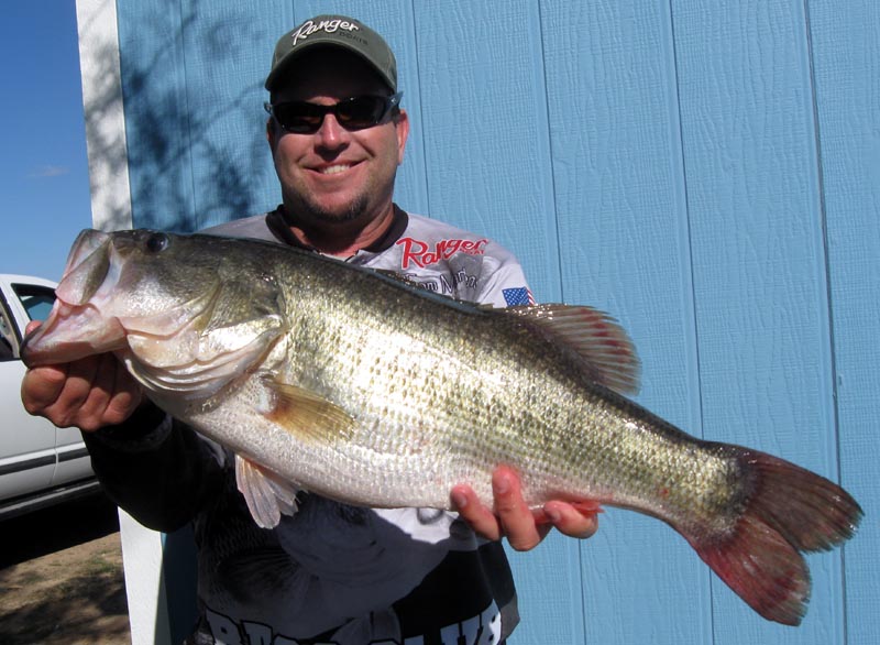 Tom with his Personal Best 9+lb O.H. Ivie bass!